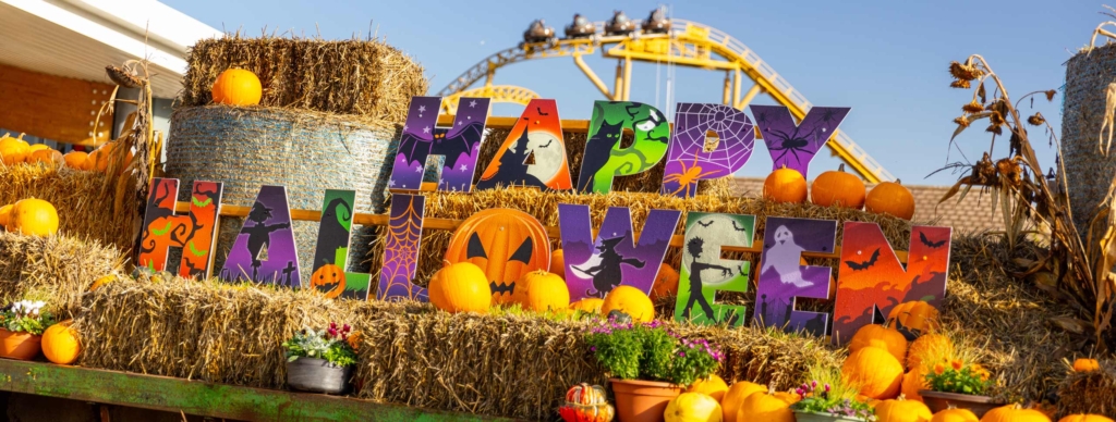 Happy Halloween seasonal display with pumpkins, hay bales and decorations at Paultons Park